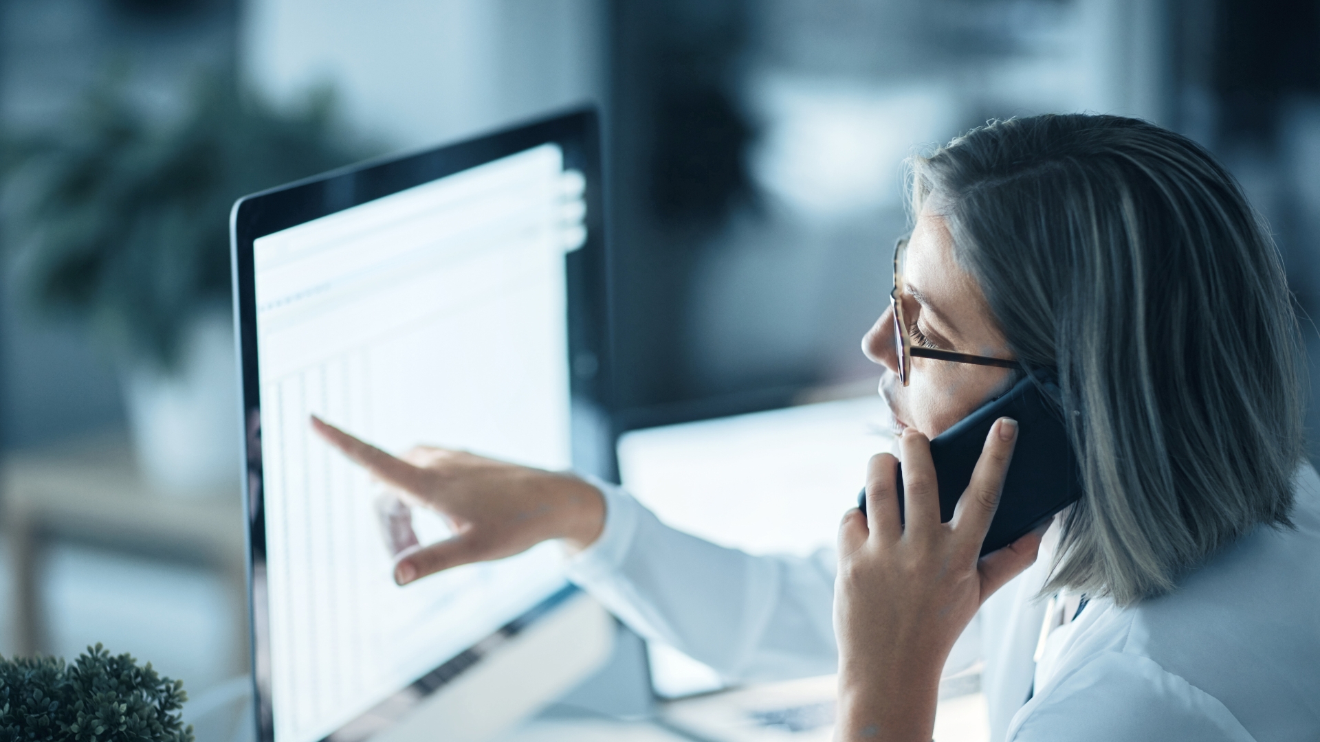 Advisory And Consulting Women Pointing At Screen