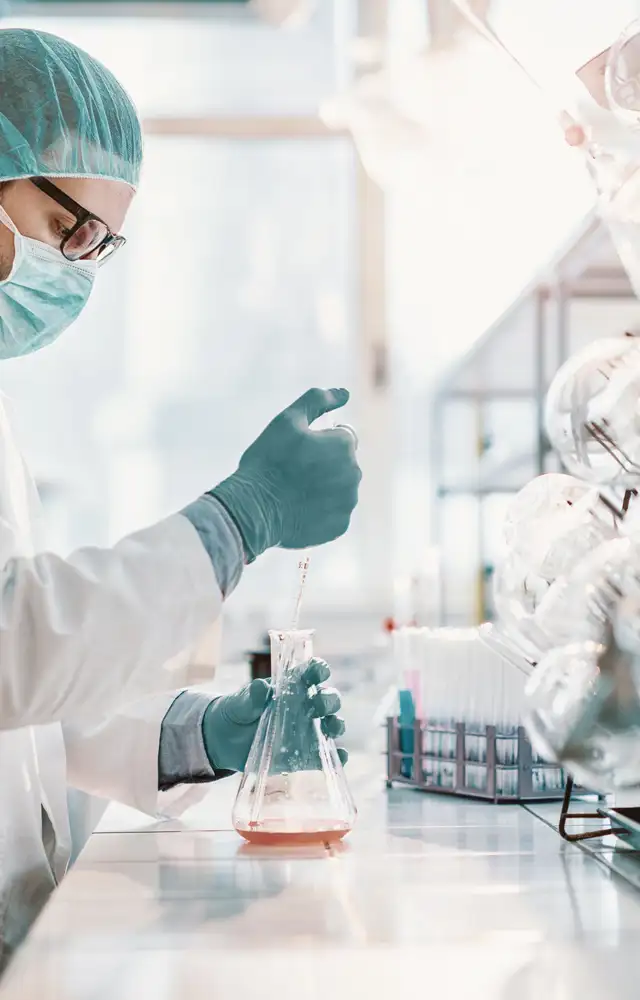 Man in a lab testing something