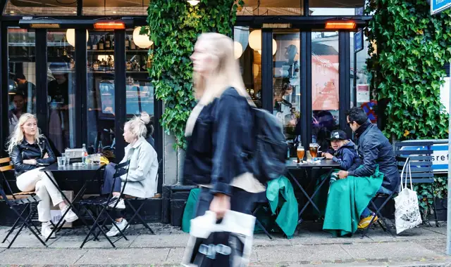Woman walking in busy city